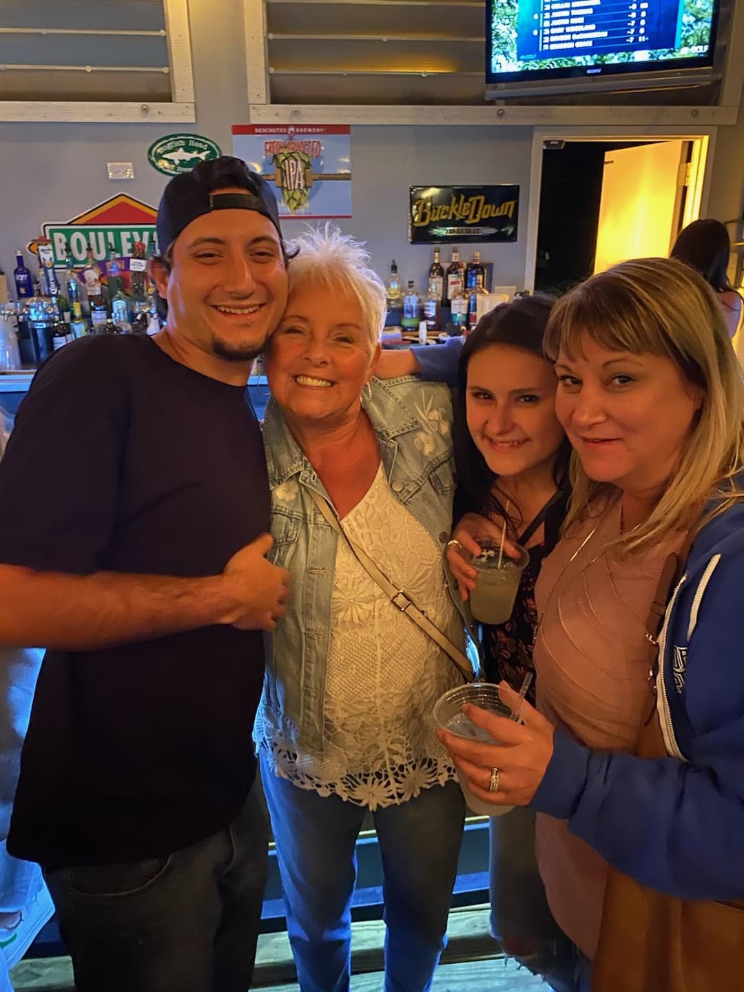 Guests having fun and enjoying drinks at Rooftop Johnnys in Palos Heights, Illinois